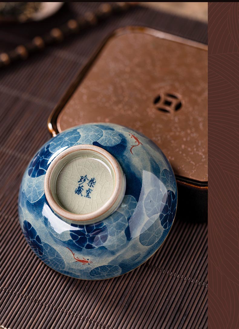 Handcrafted Jian Zhan Jingdezhen Porcelain Tea Cup with Blue & White Lotus Fish Design