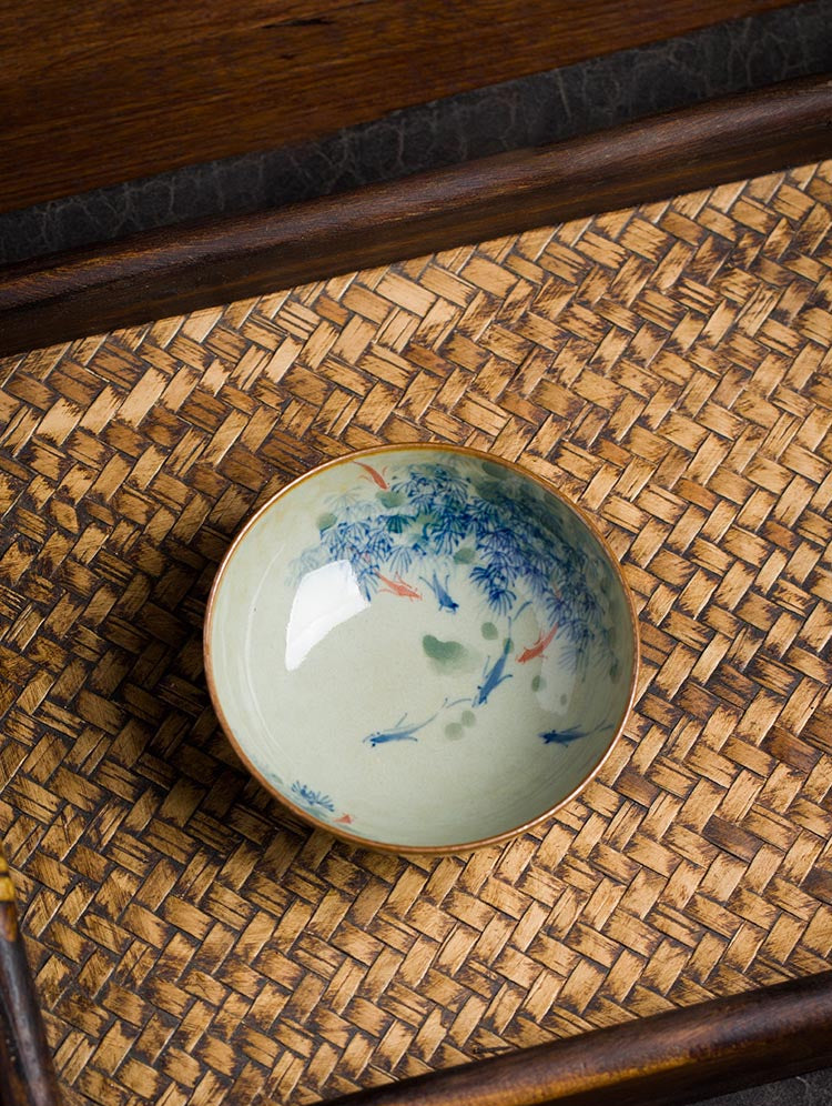 Handcrafted Jingdezhen Porcelain Tea Cup - Fish Play Design