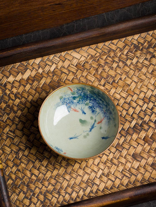 Handcrafted Jingdezhen Porcelain Tea Cup - Fish Play Design