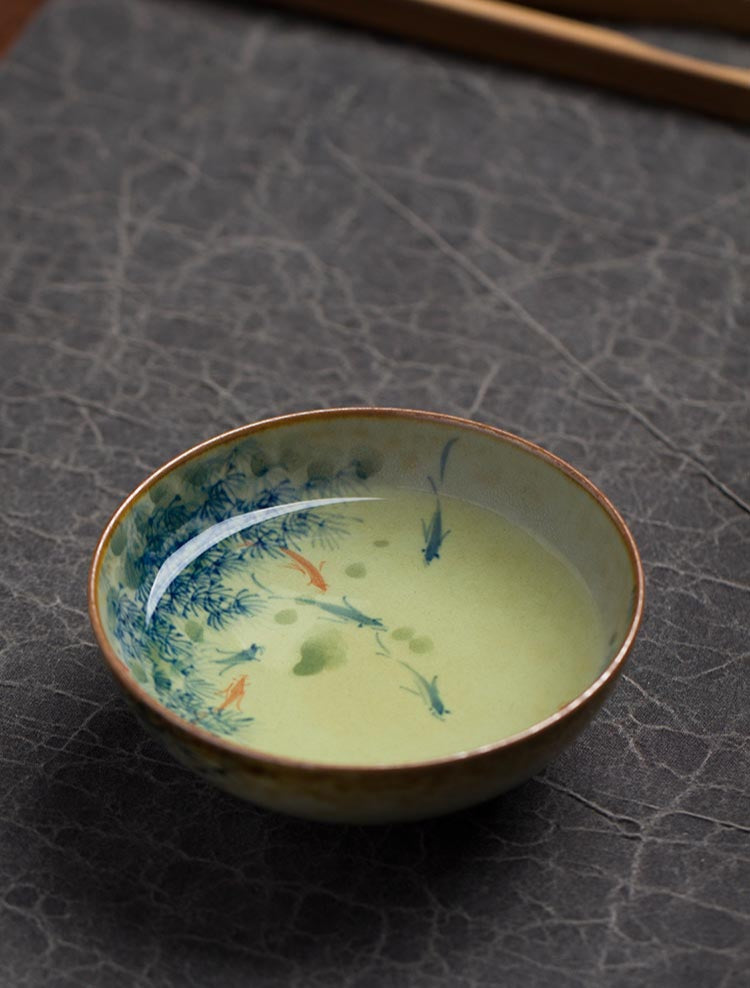 Handcrafted Jingdezhen Porcelain Tea Cup - Fish Play Design