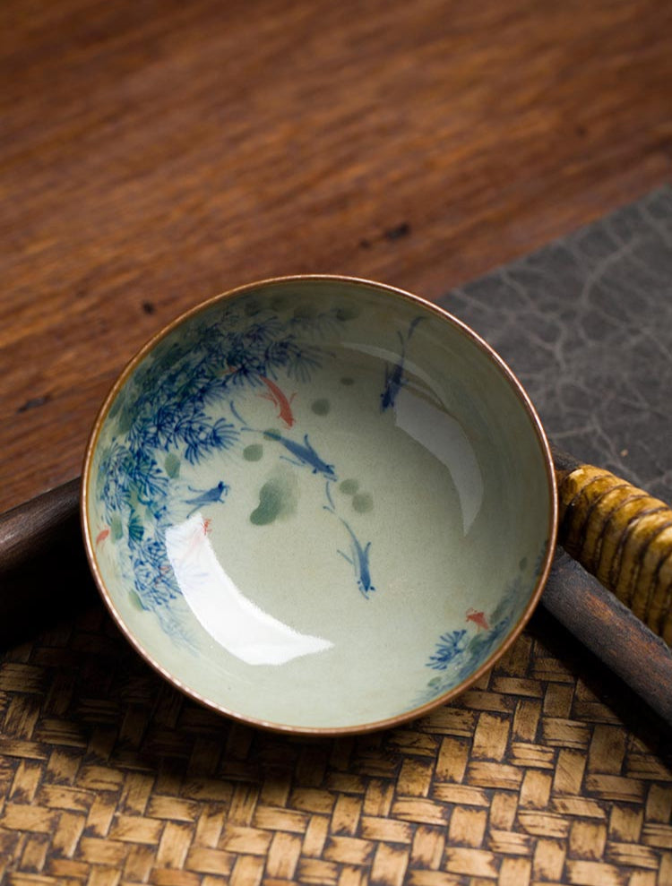 Handcrafted Jingdezhen Porcelain Tea Cup - Fish Play Design