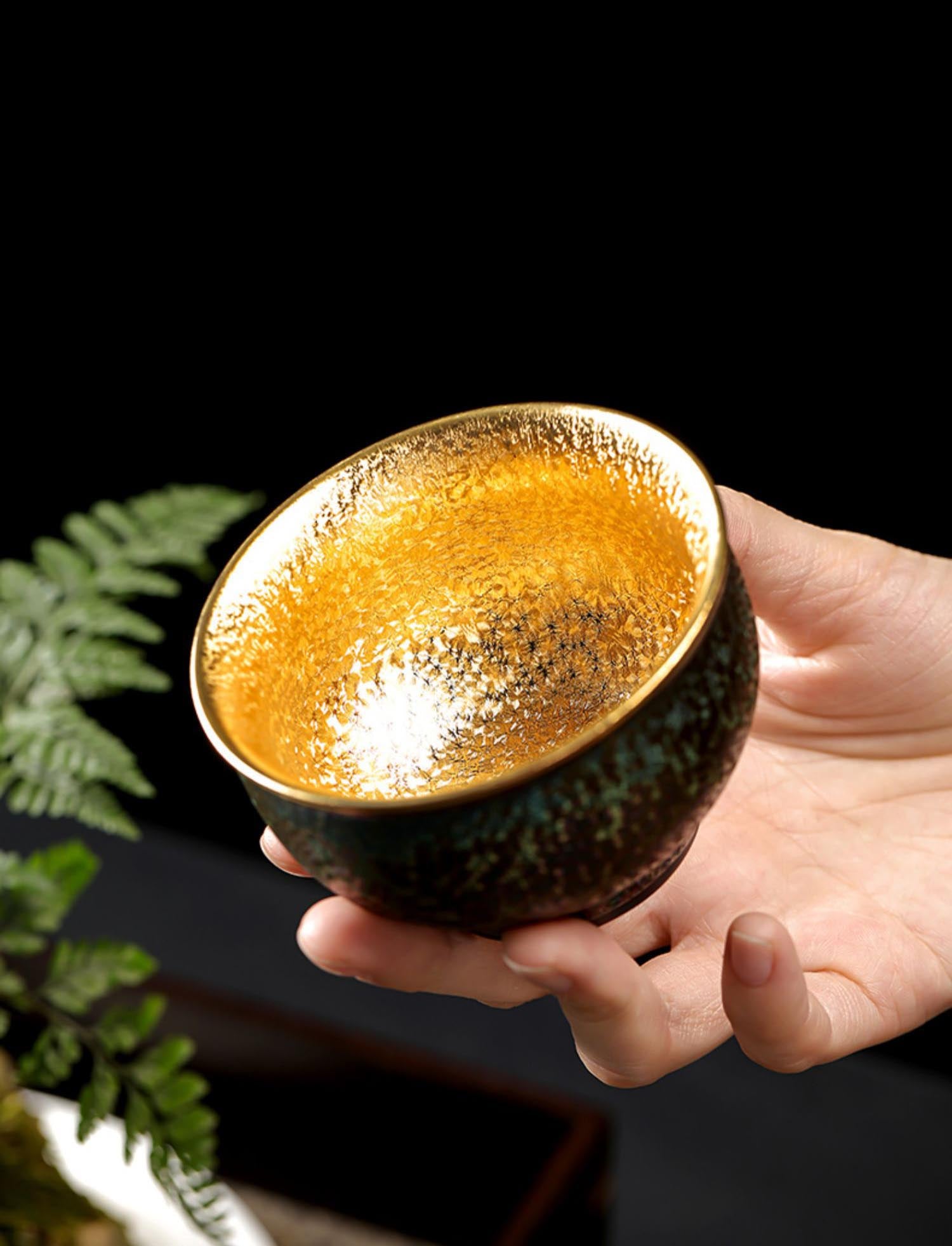 Peacock Luster Gilded Teacup - Majestic Ceramic Artistry from Dehua