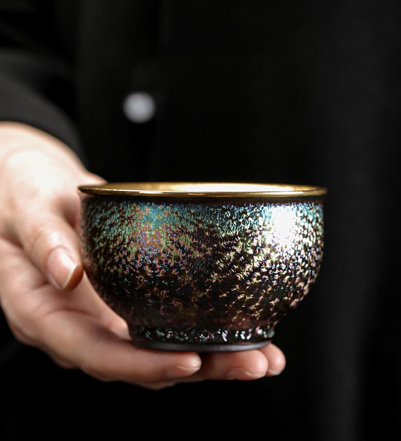 Peacock Luster Gilded Teacup - Majestic Ceramic Artistry from Dehua